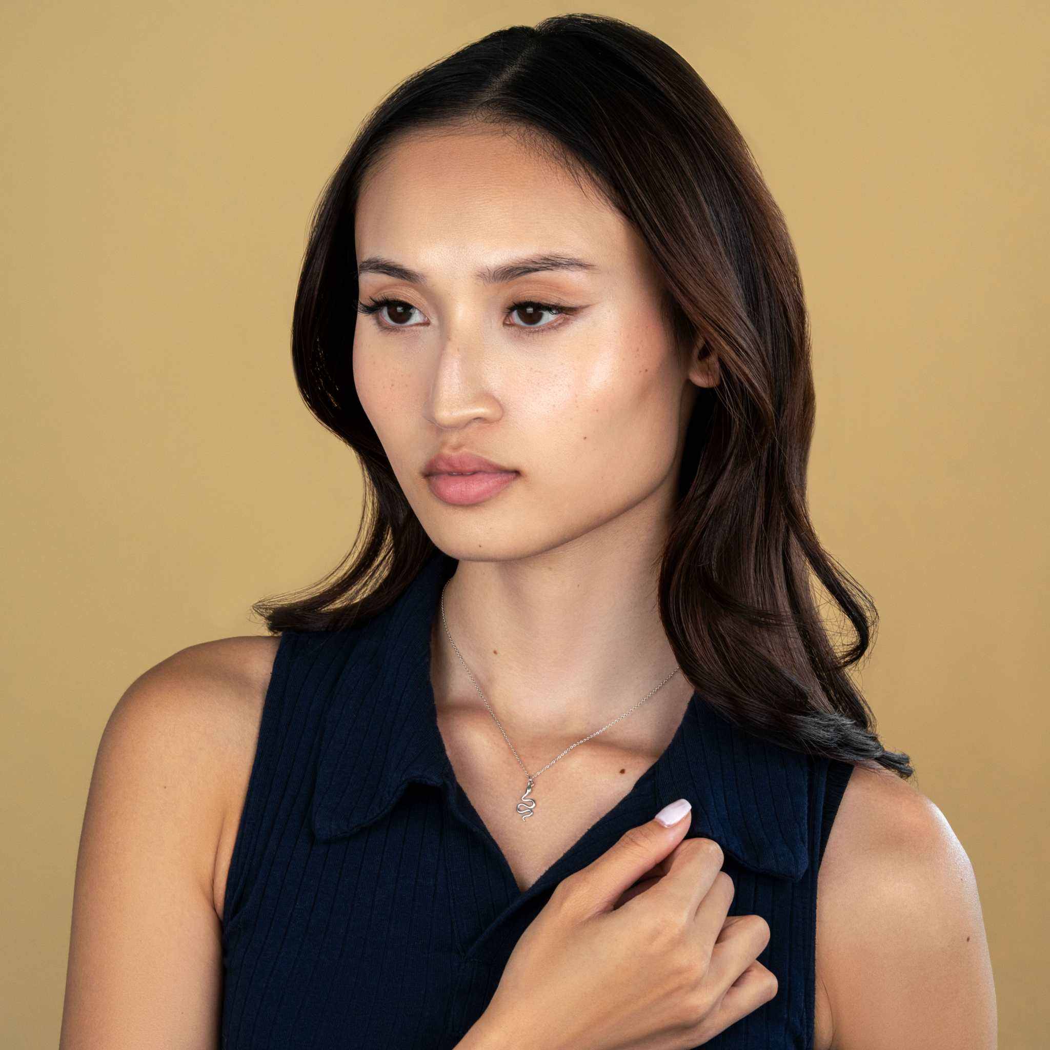 Delicate chain design link earrings in sterling silver and 18K gold.