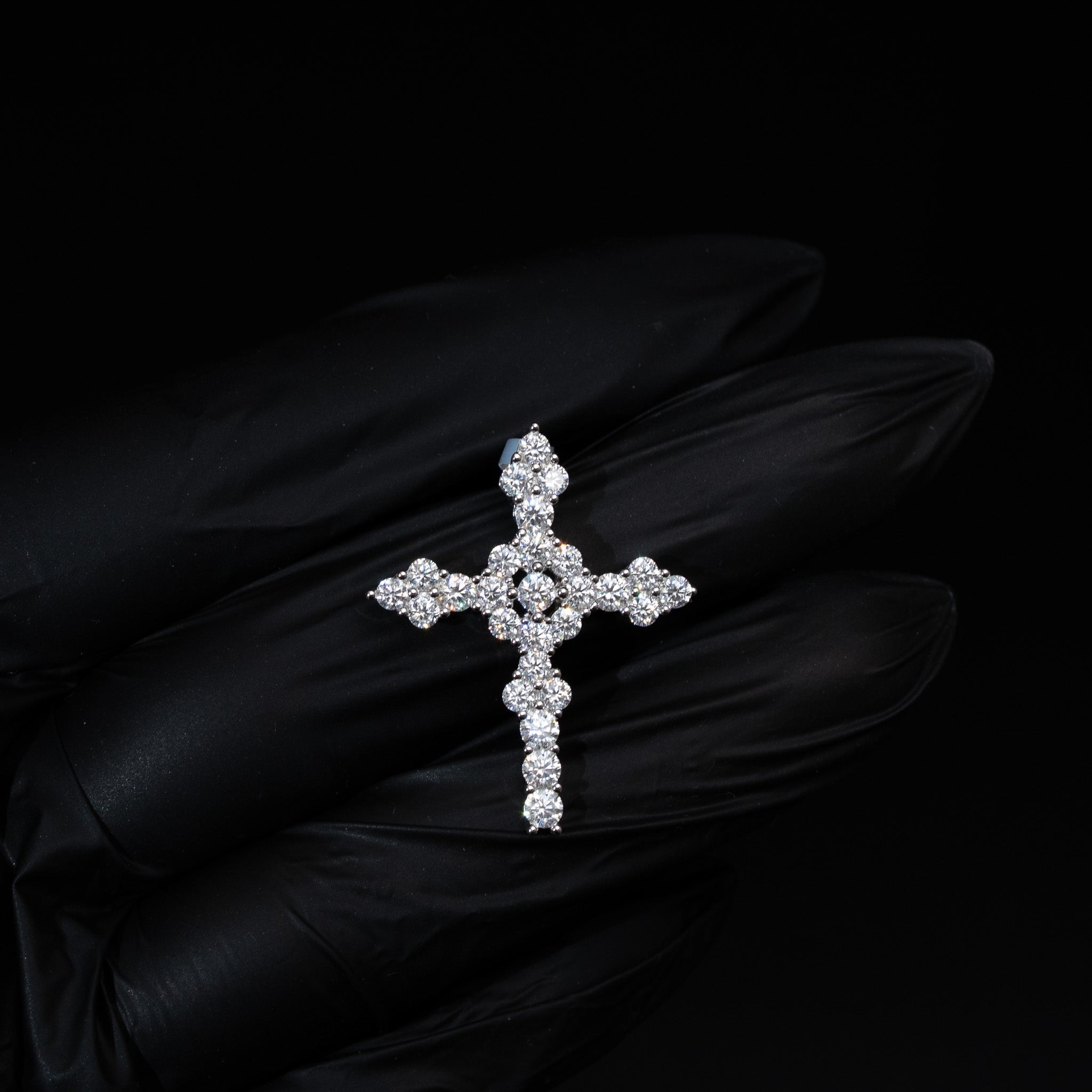 Moissanite clustered cross pendant in 925 sterling silver with 2.09 carats VVS1 D color stones, lightweight and elegant design.