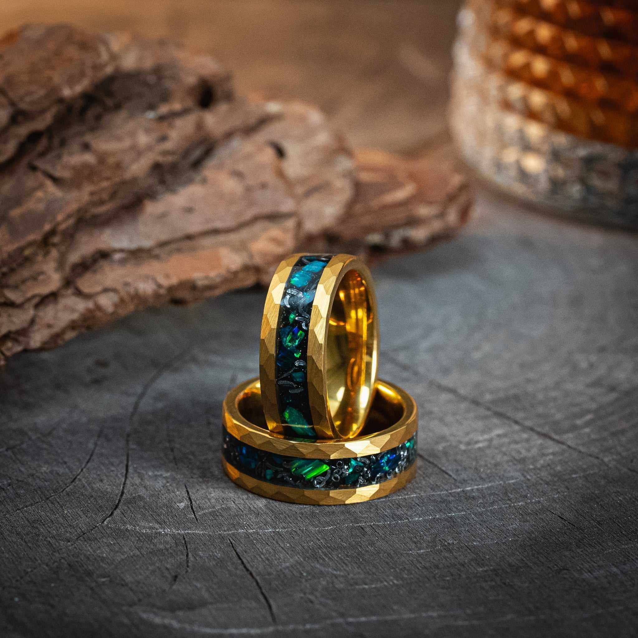 Hammered gold tungsten ring with green opal and meteorite inlay, 8mm wide, scratch-resistant carbide, comfort fit, celestial design.