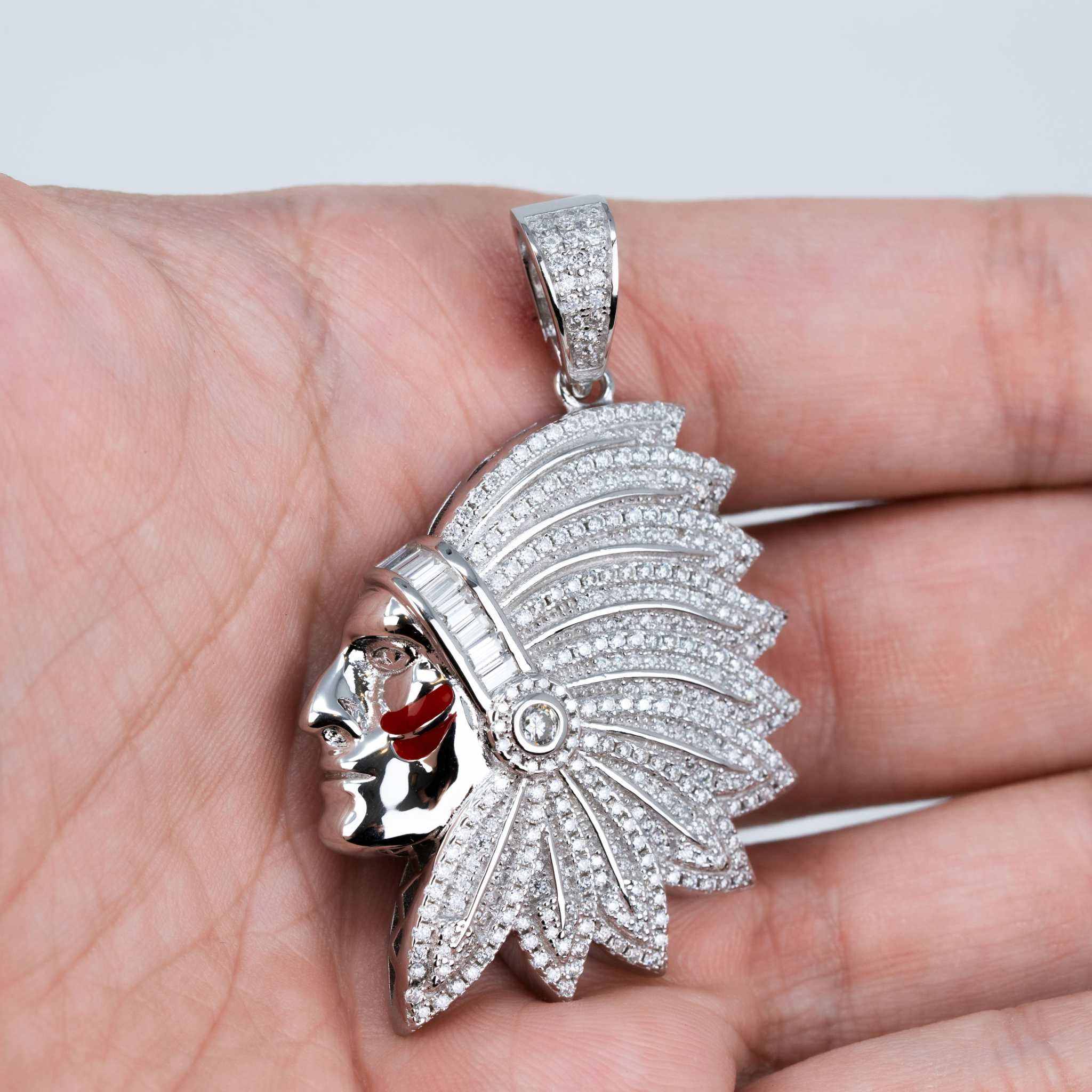 Native American Indian Moissanite Pendant in 925 sterling silver, featuring 2.59ct stones, shown in a hand for scale.
