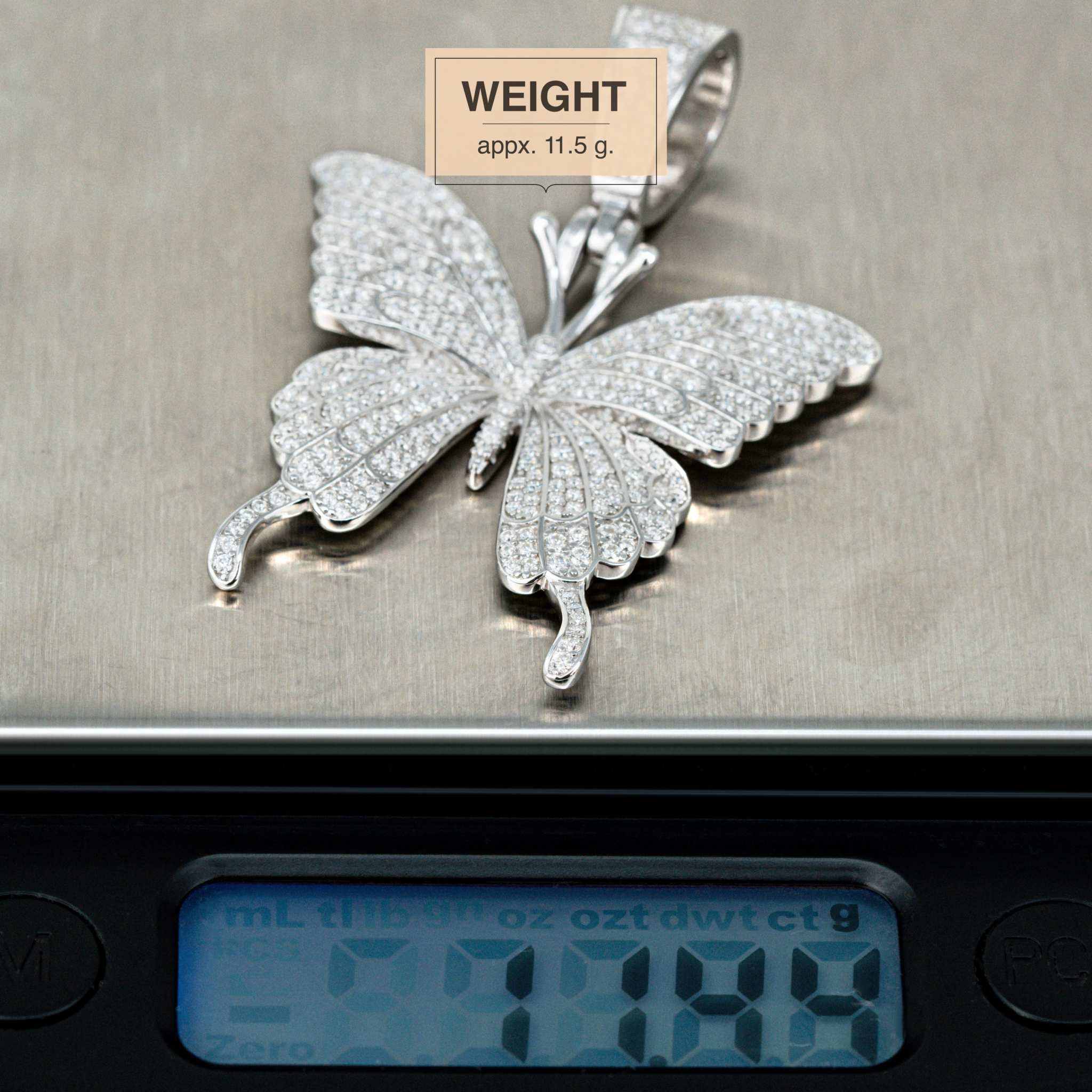Womens Moissanite Butterfly Pendant on sale with 2.58 ct stones, 925 sterling silver, weighing 11.5 grams.