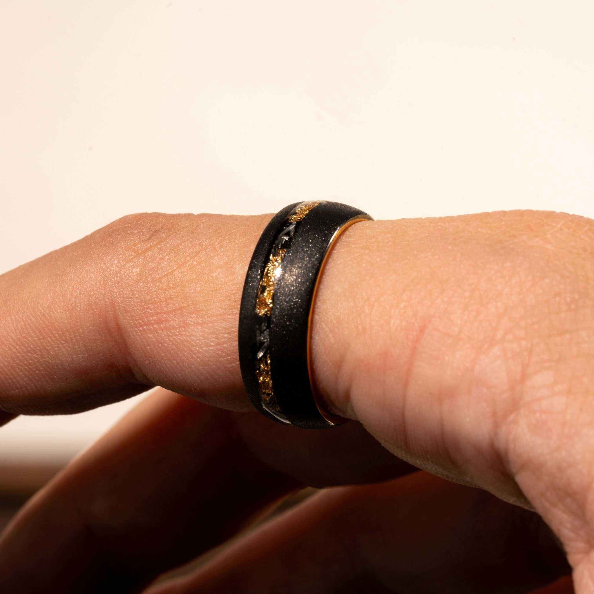 Sandblasted gold leaf meteorite ring with Muonionalusta meteorite detail, comfort-fit design.