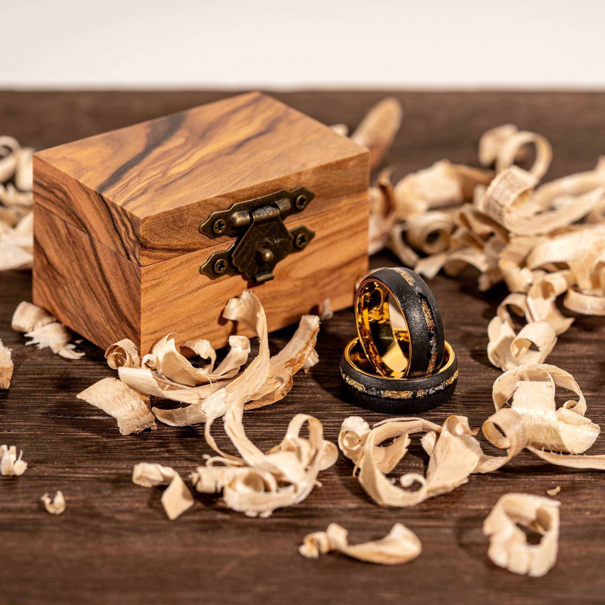 Sandblasted gold leaf meteorite ring with engraving option in olive wood box.