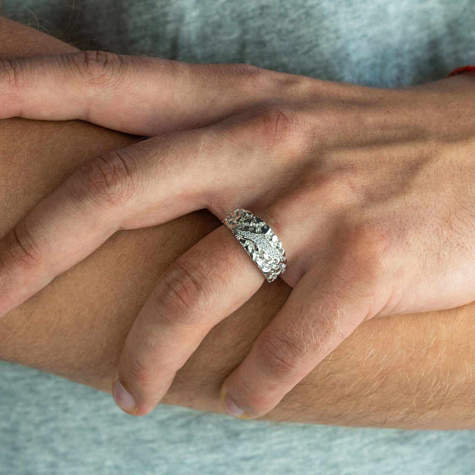Nugget Claw Mark Ring in solid 925 sterling silver, worn on hand.