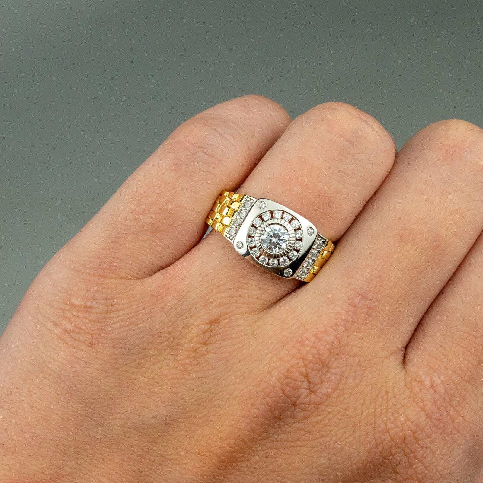 10K yellow gold plated watch ring with cubic zirconia and flexible band design.
