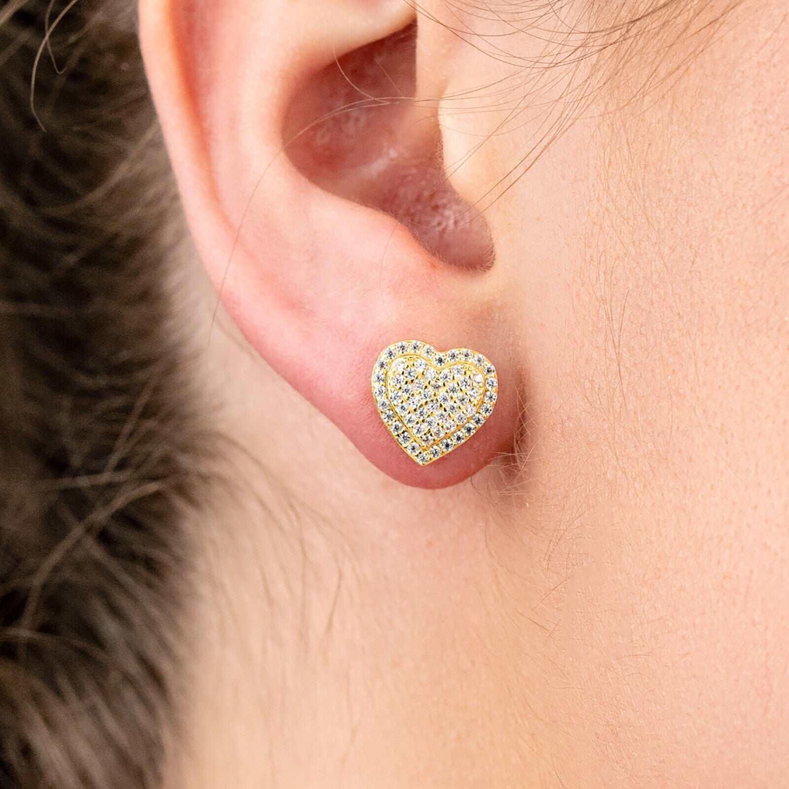 Men's heart-shaped 925 sterling silver and 14k gold earrings.
