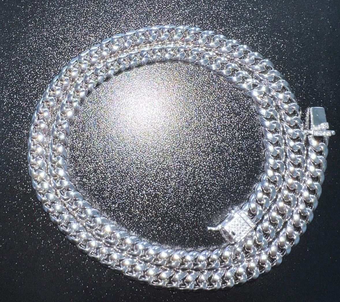 Men's Moissanite Real Cuban Curb Link Chain Hip Hop Solid 925 Silver Necklace on black surface.