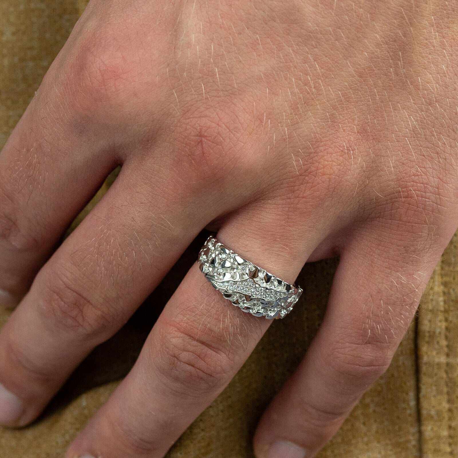 Solid 925 sterling silver Nugget Claw Mark Ring on hand, featuring clear CZ gemstone, 10mm width, made in Italy.