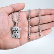 Unisex Moissanite Jesus Head Piece Pendant with 3.3mm Rope Chain Necklace in 925 Silver held in hand.