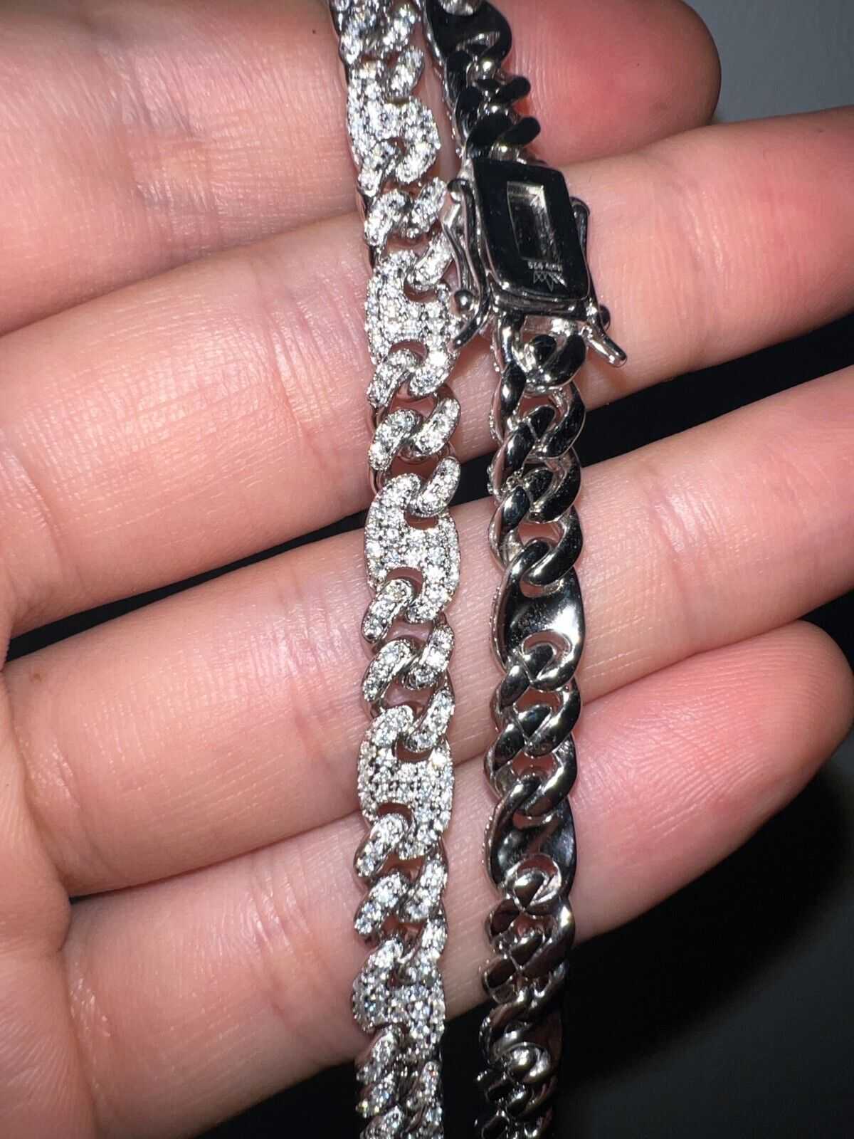 Moissanite Miami Cuban Mariner Link Chain Iced Hip Hop Silver Necklace in hand.