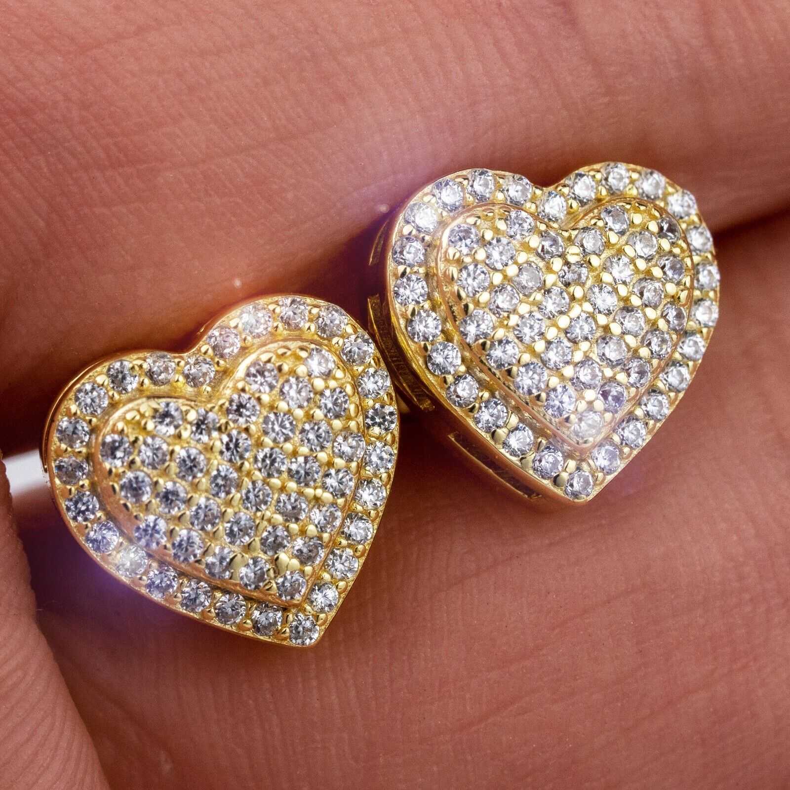 Men's 925 sterling silver and 14k gold heart-shaped earrings with VVS clear stones.