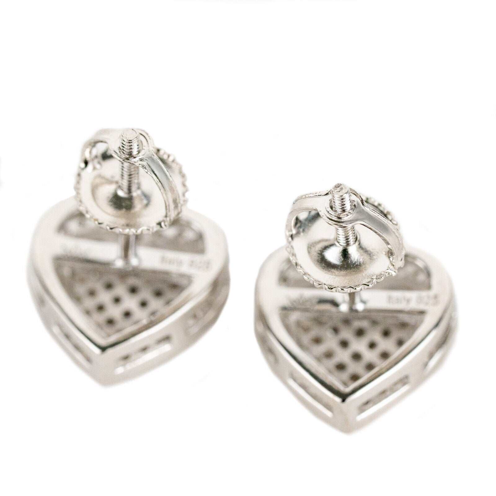 Heart-shaped stud earrings in solid 925 sterling silver with VVS clear CZ stones, unisex design by Morf Jewelry.