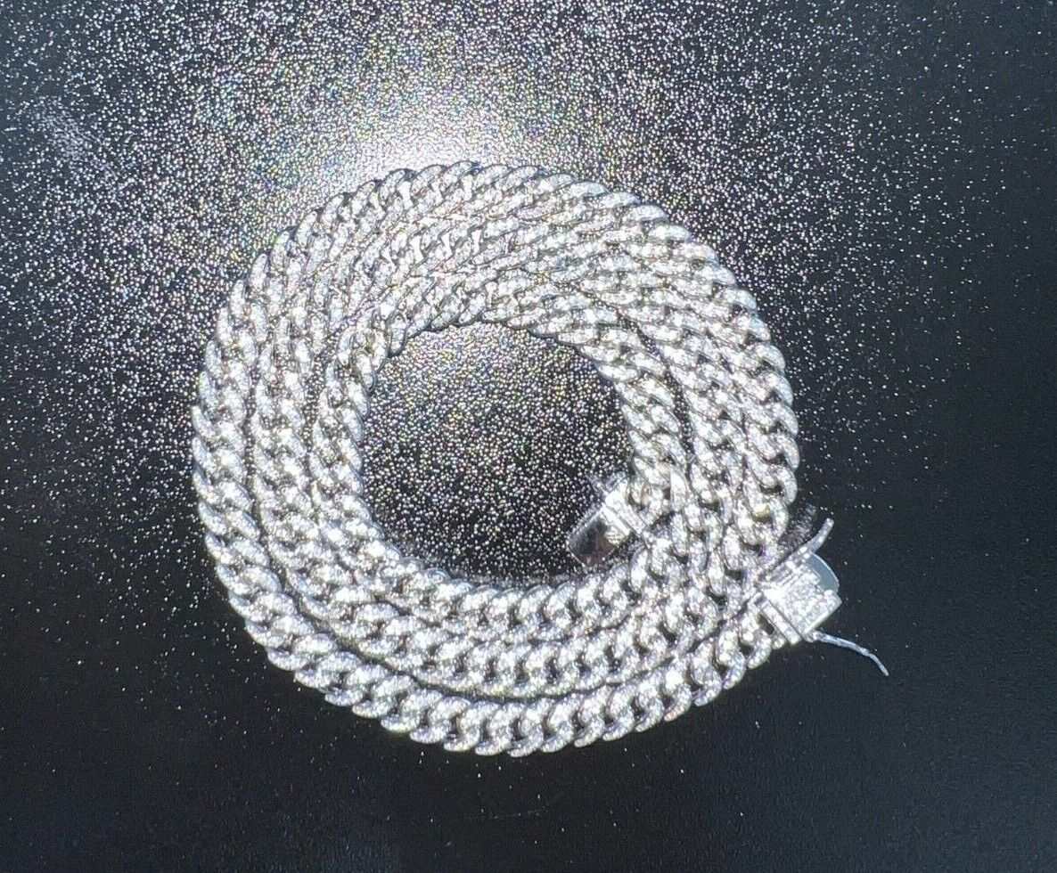 Mens real moissanite iced Cuban link chain, solid 925 sterling silver, hip hop style.