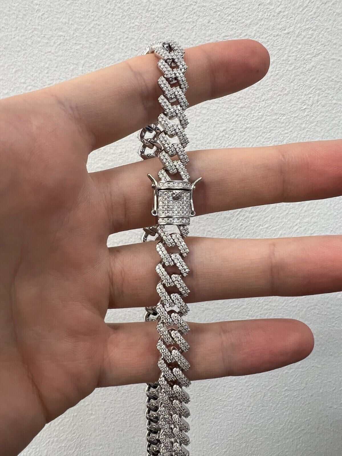 10mm Moissanite Miami Cuban Chain with rhodium-finished sterling silver.