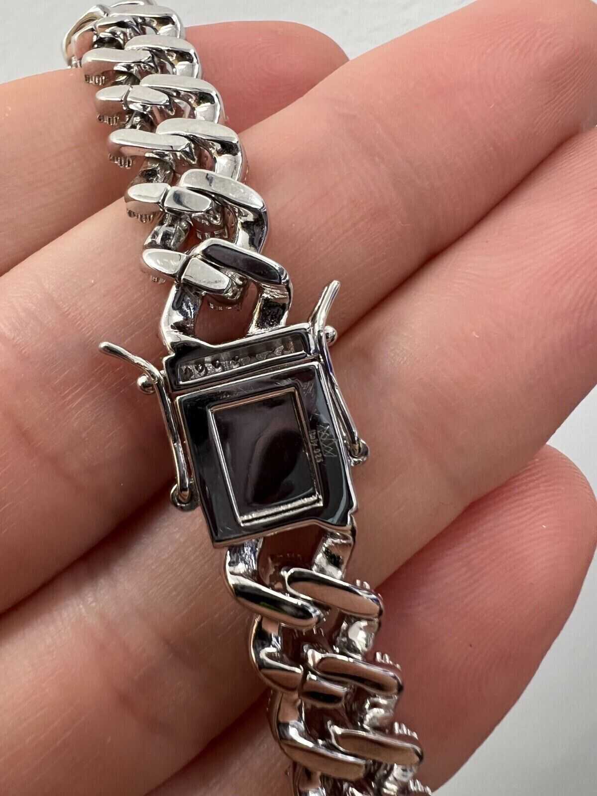 10mm Moissanite Miami Cuban Chain in sterling silver with rhodium finish close-up.
