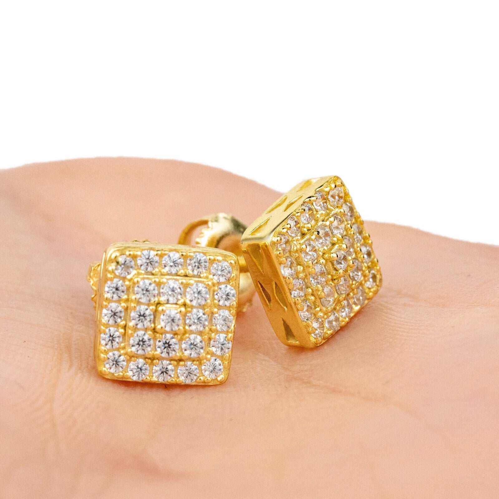 Square shaped stud earrings in 14K yellow gold plating with cubic zirconia on sterling silver, featuring screw back closure.