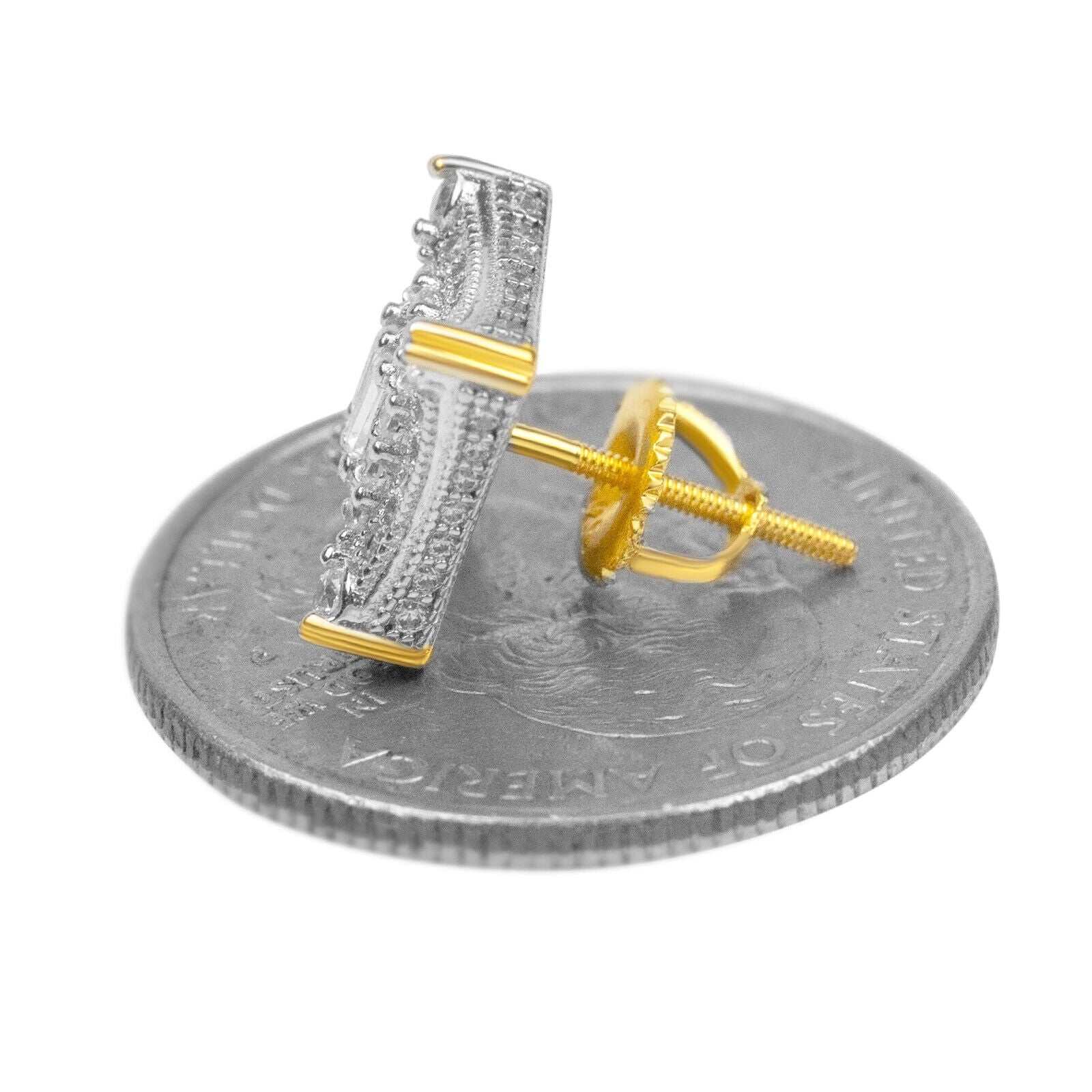 Mens sterling silver earrings with 14K gold finish and CZ stones on a coin for size reference.