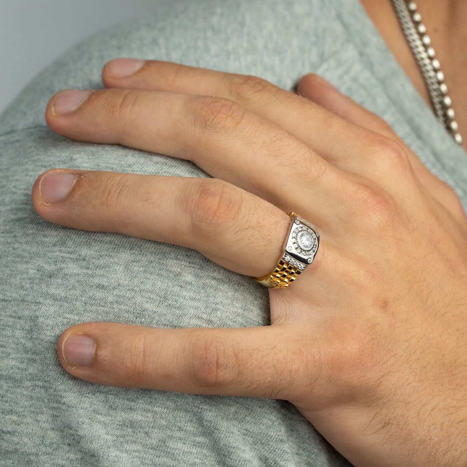 10K yellow gold plated watch ring with cubic zirconia and flexible band design.