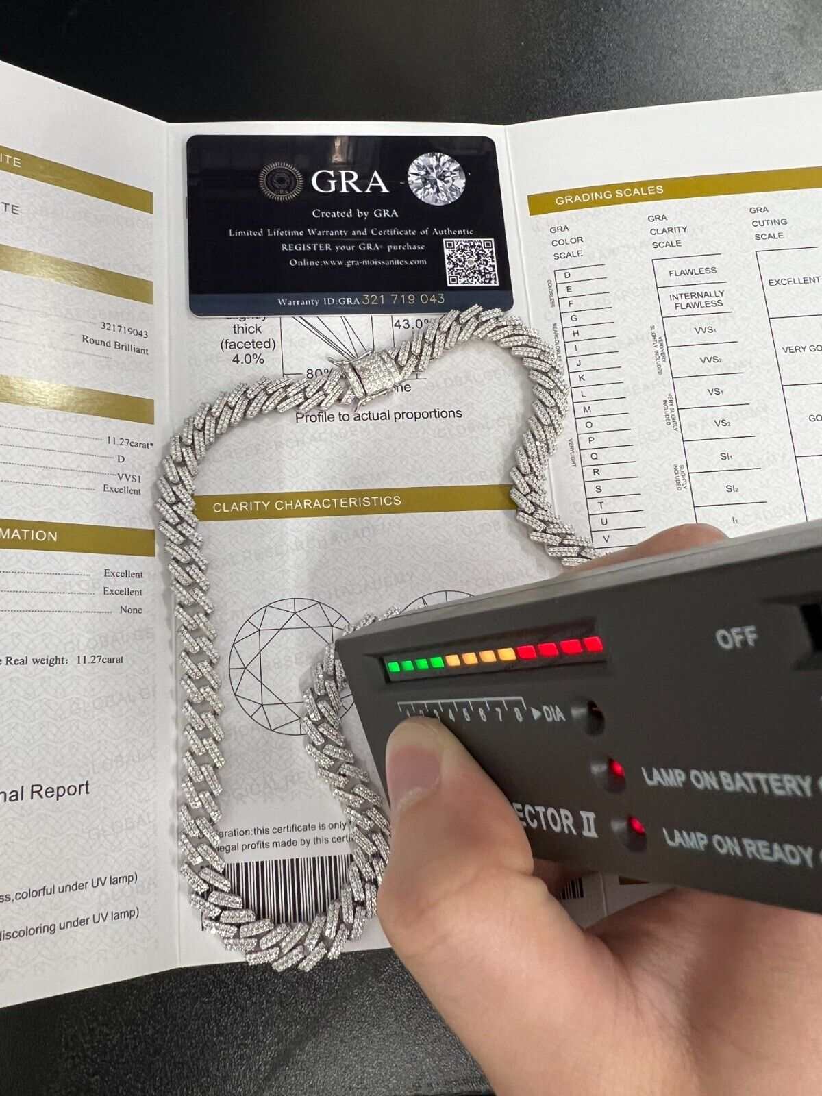 10mm Moissanite Miami Cuban Chain with diamond tester, GRA certificate, and warranty card.