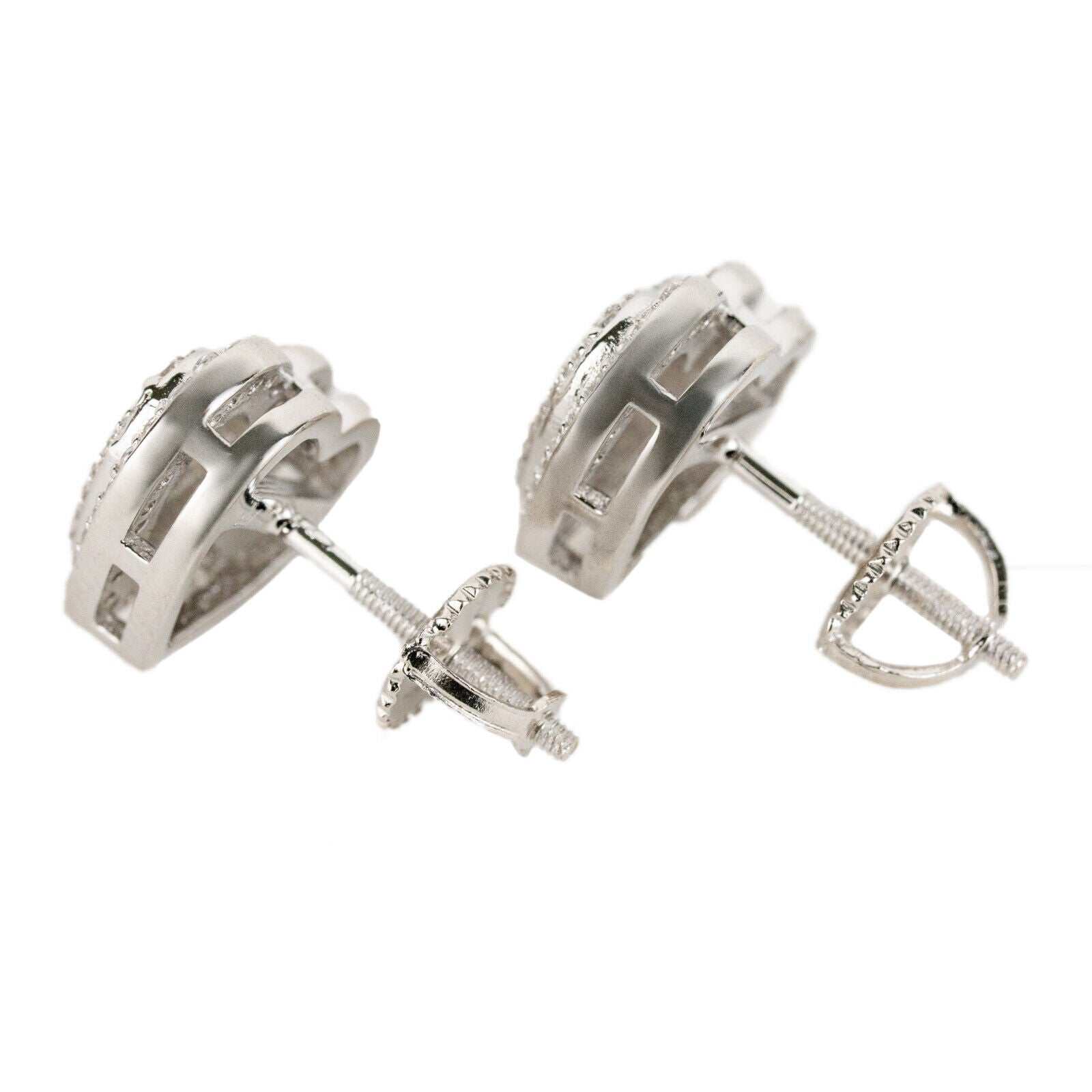 Heart shaped stud earrings in sterling silver with VVS clear CZ stones, unisex jewelry.