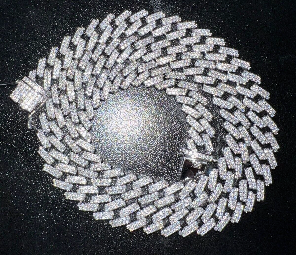 10mm Moissanite Miami Cuban Chain in sterling silver with rhodium finish, featuring icy VVS1 moissanite stones.