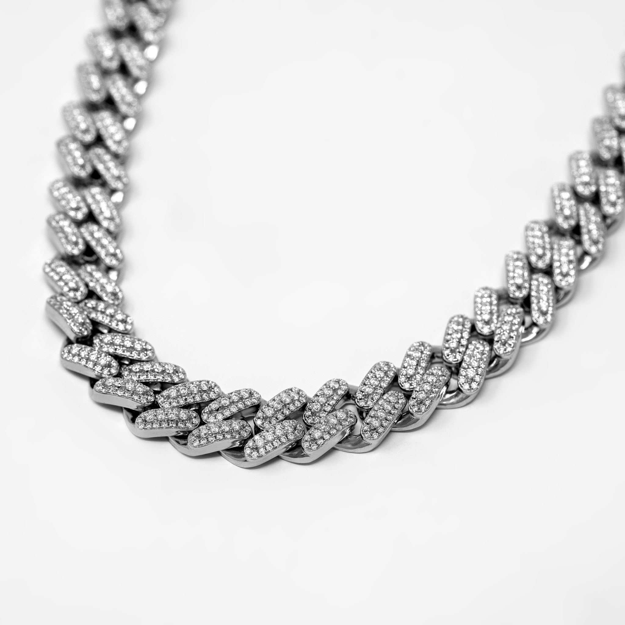 12mm Moissanite Miami Cuban Link Chain in sterling silver with rhodium finish and VVS1 icy moissanite stones