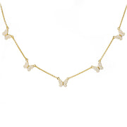 Delicate butterfly necklace with gold chain and CZ stones.