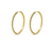 Pair of 14k gold plated croissant hoop earrings with textured design and 29.3mm diameter