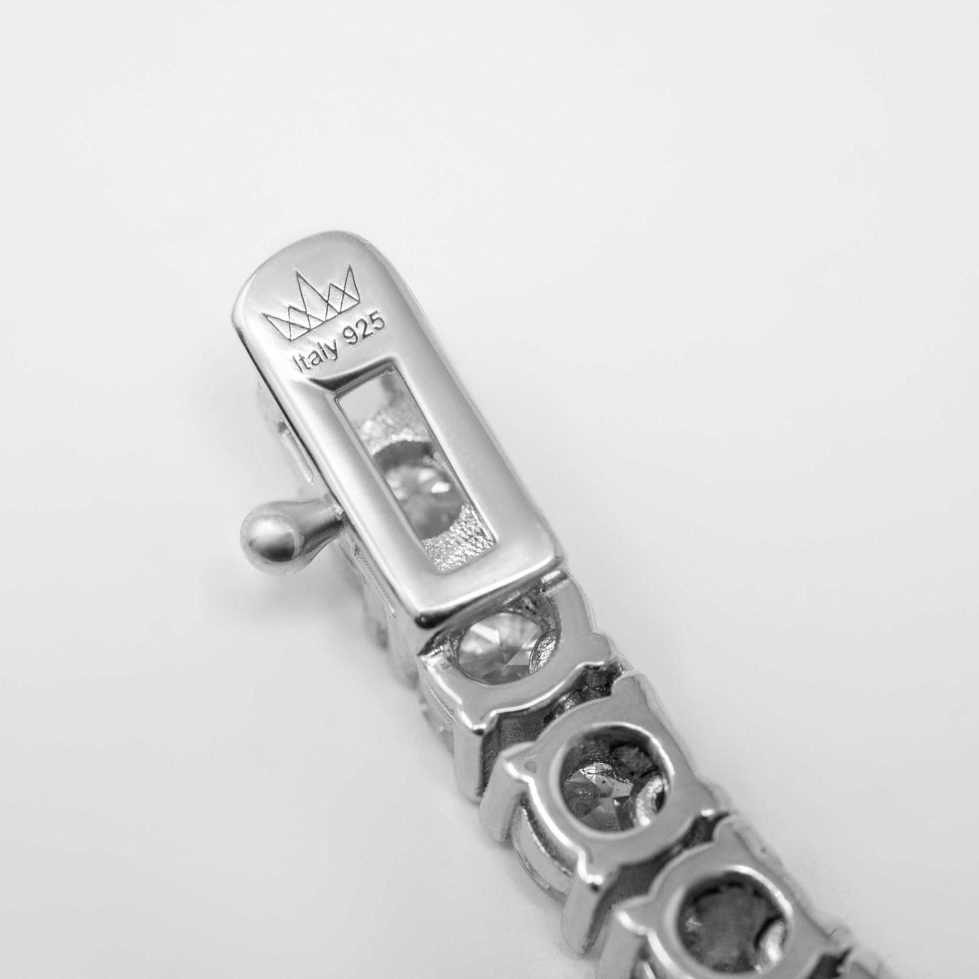 4mm Moissanite Tennis Chain detail in sterling silver with rhodium finish.