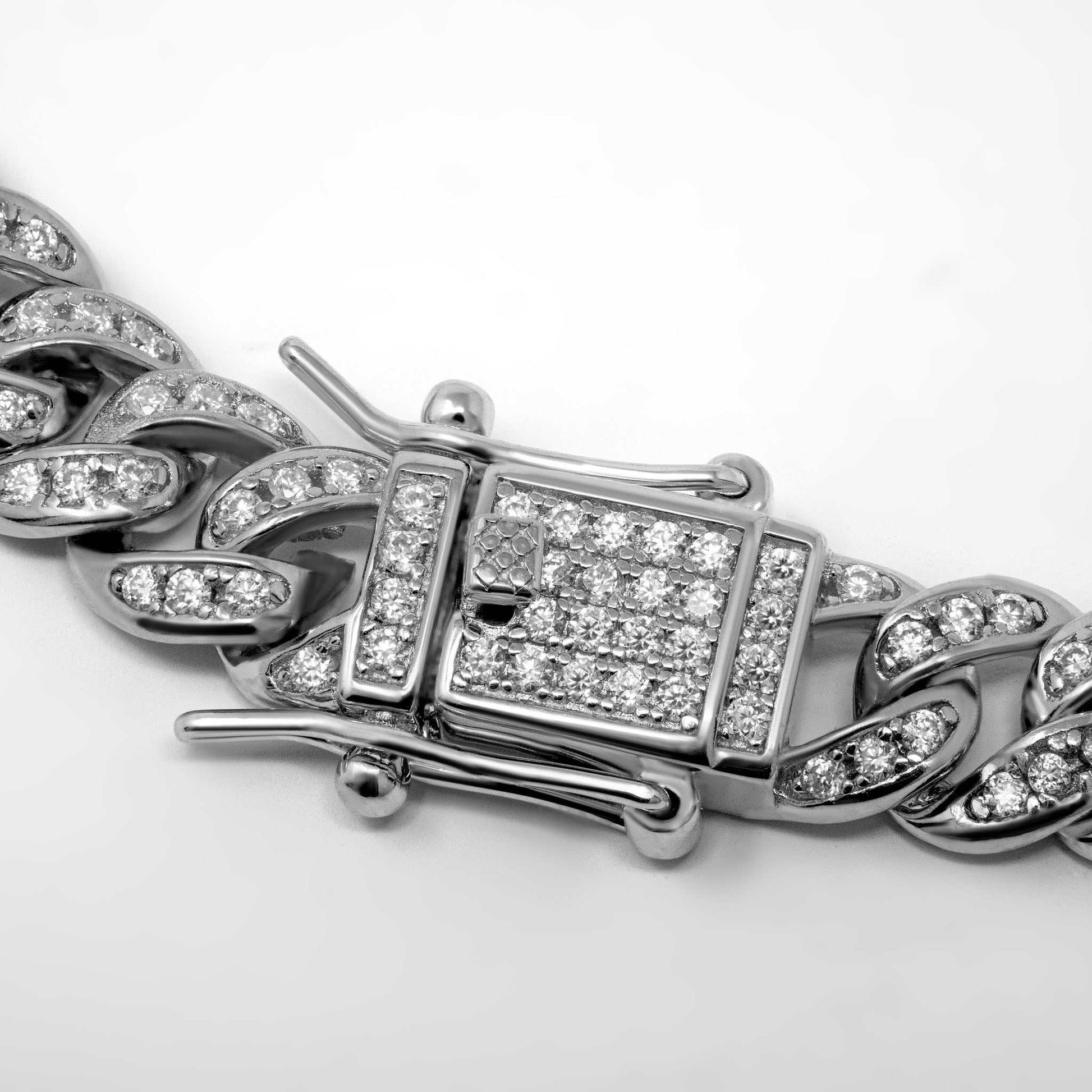 6MM Iced Moissanite Miami Link Chain with D color VVS1 stones in 925 sterling silver.