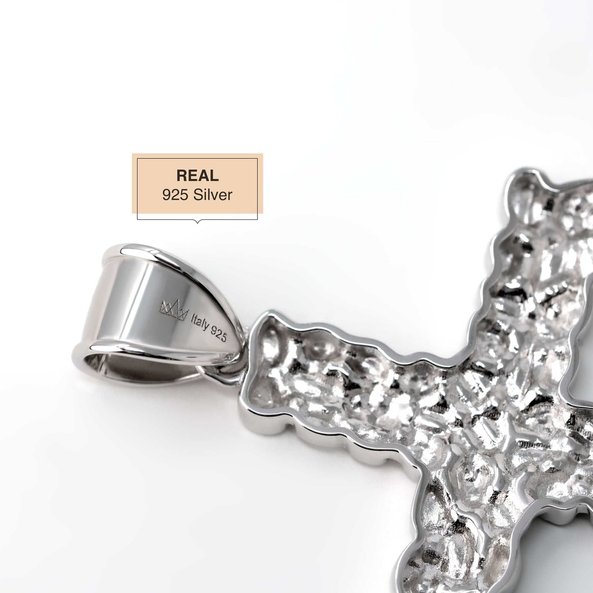 Sterling silver nugget cross pendant, handcrafted, with textured finish.