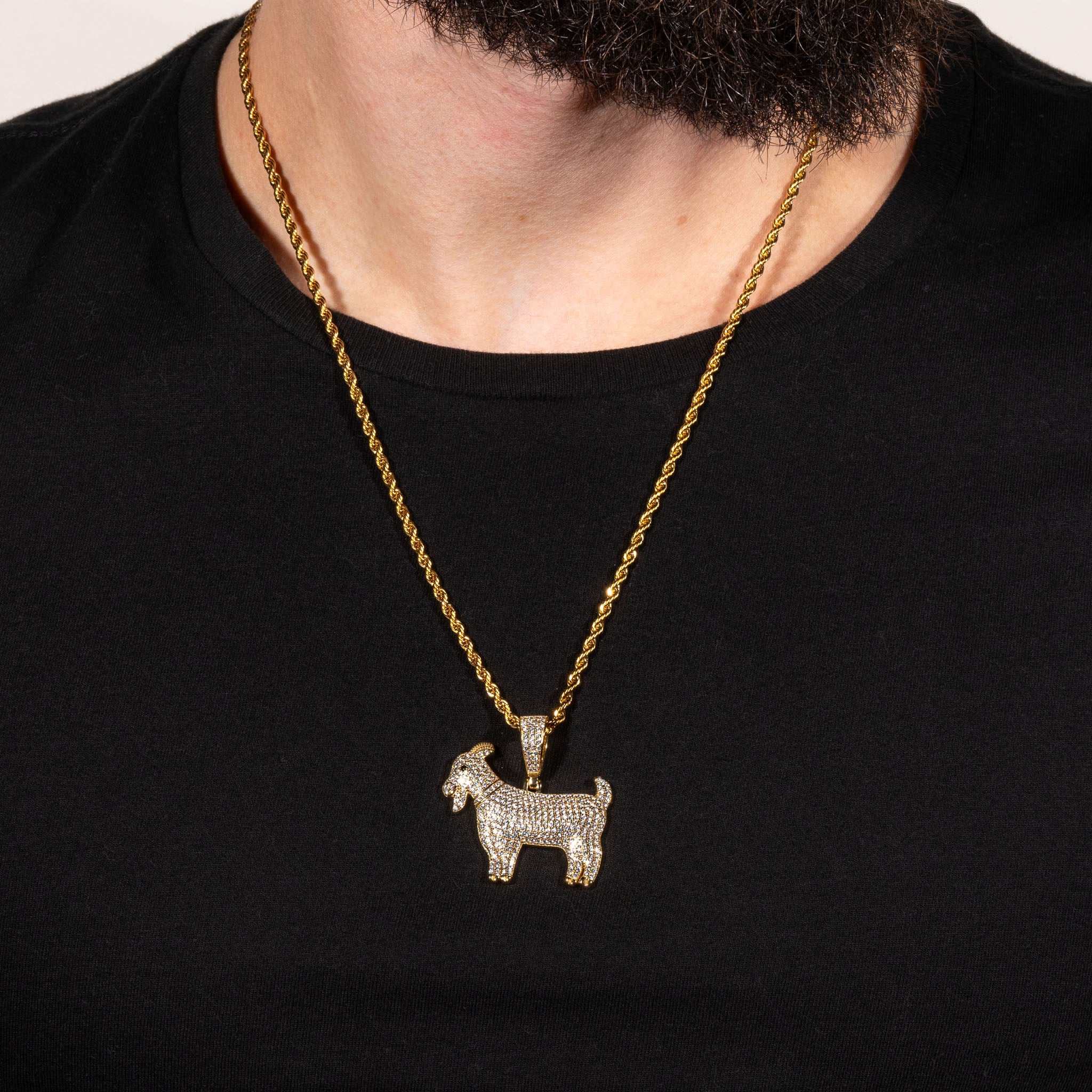 GOAT Pendant in sterling silver with rhodium or 14K gold plating worn on black shirt.