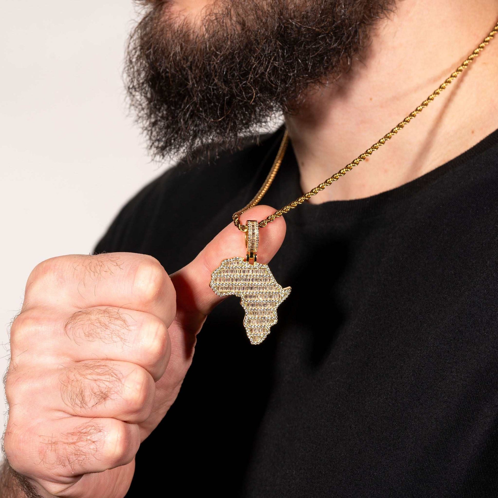 Sterling silver Africa pendant with 3D micropave design and man-made diamonds.
