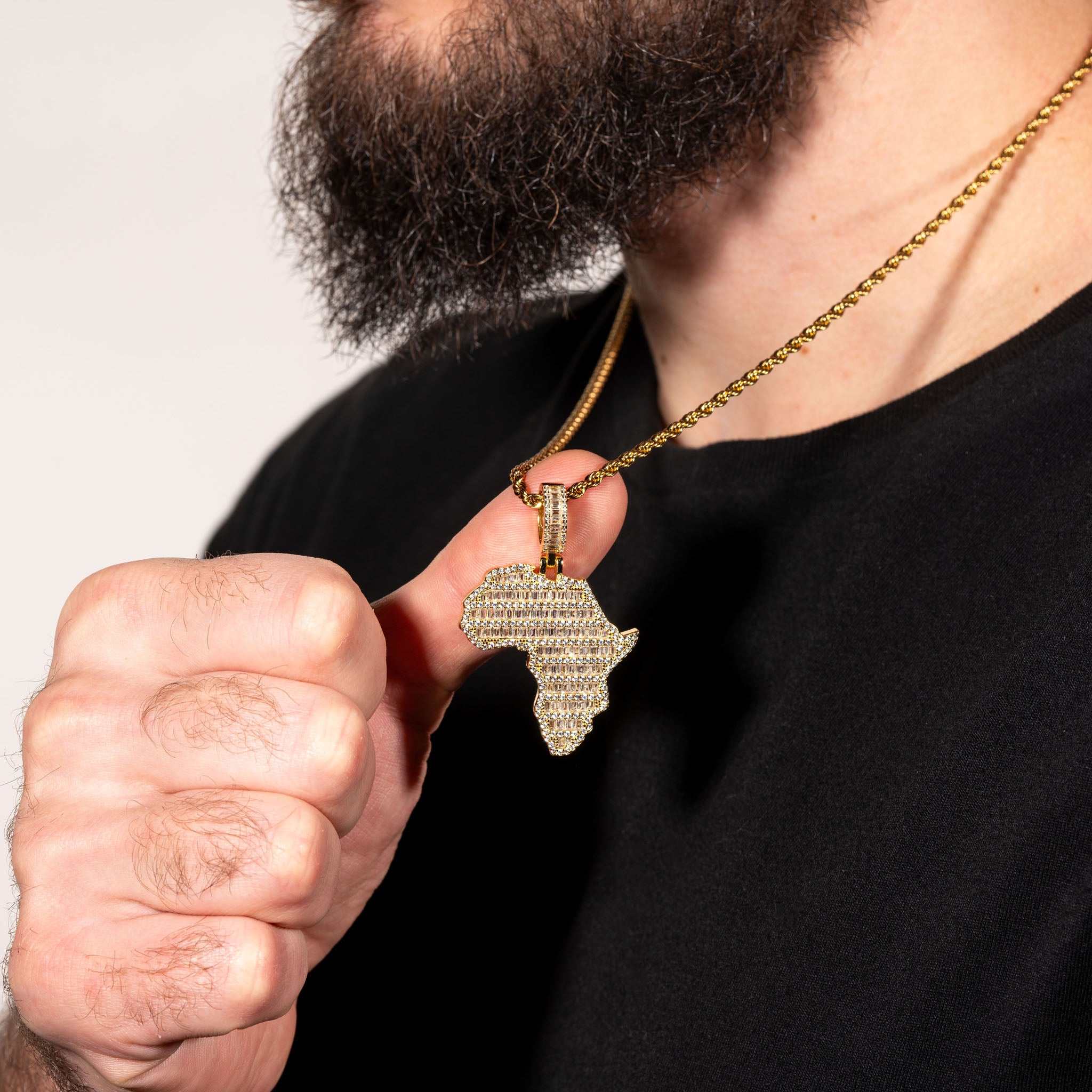 Sterling silver Africa pendant with 3D micropave design and man-made diamonds.