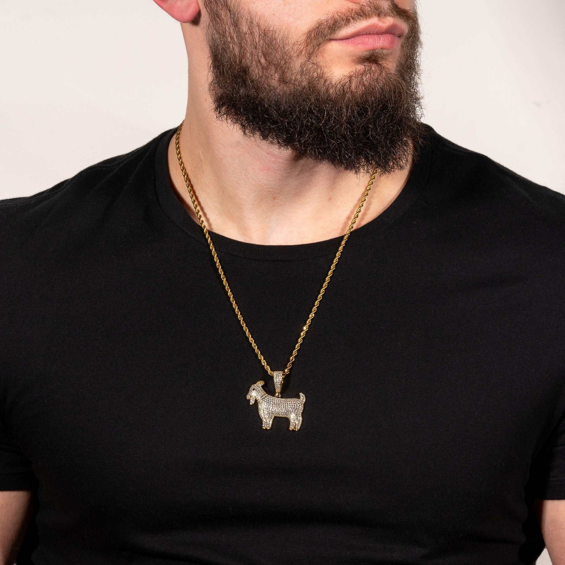 GOAT Pendant in gold plating on a chain.