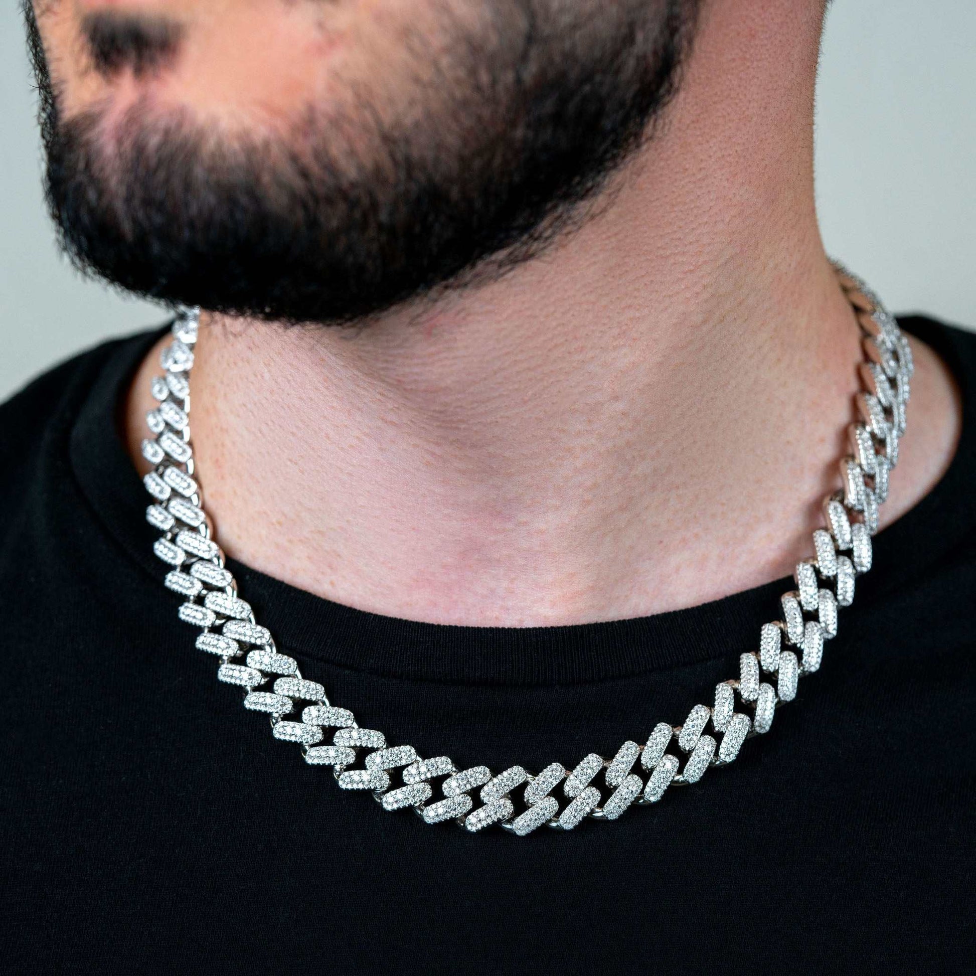 13mm men's moissanite Miami Cuban link chain in sterling silver with rhodium finish.