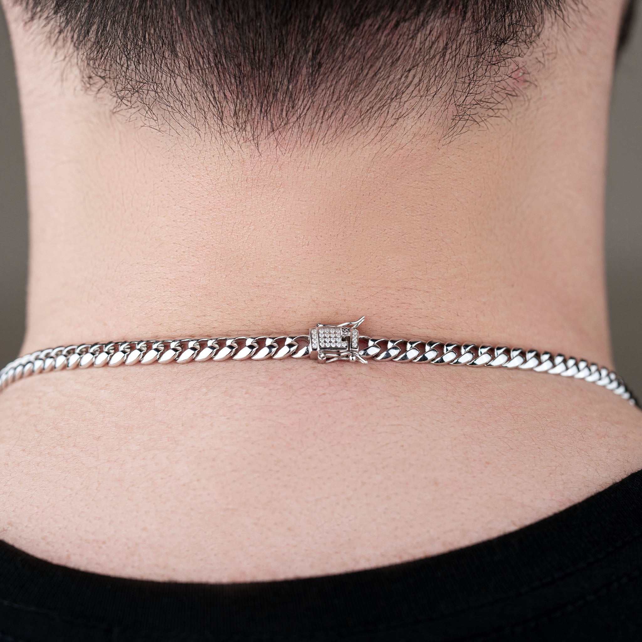 6MM Miami Cuban Link Chain on neck, sterling silver, moissanite stones.