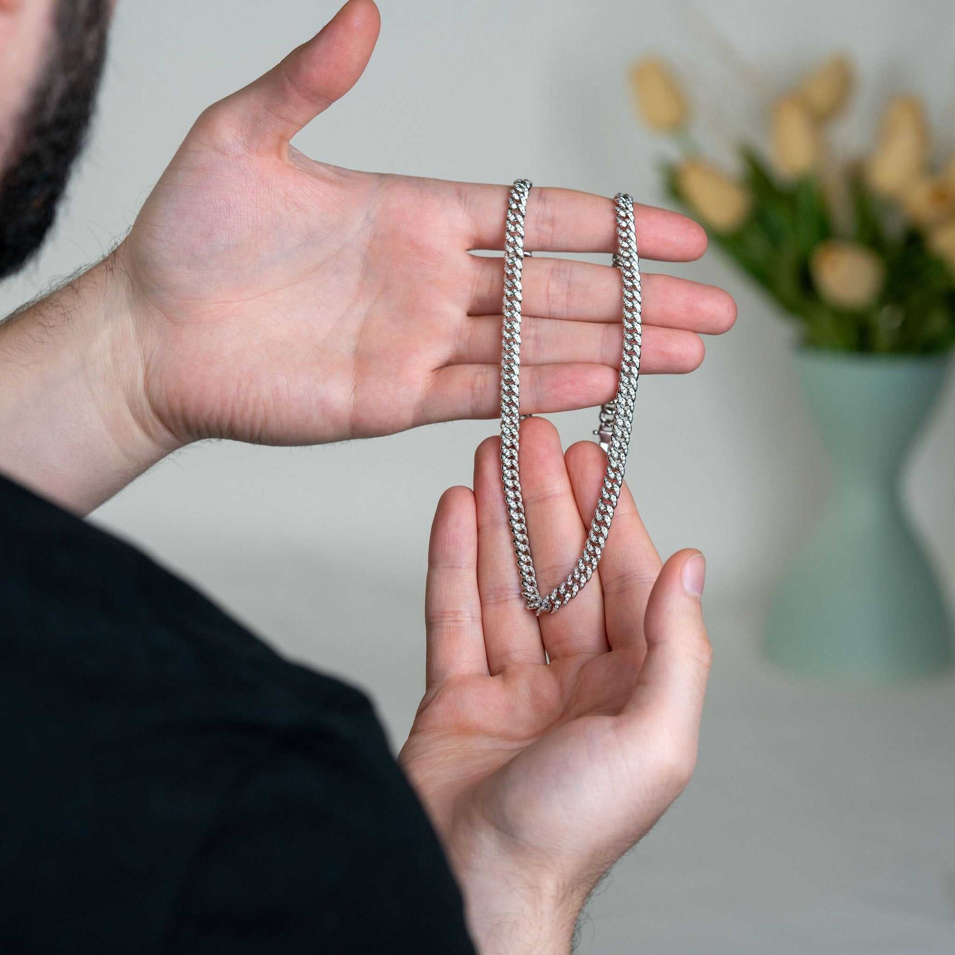 6MM iced moissanite Miami link chain in hands, solid 925 sterling silver, Cuban link design.