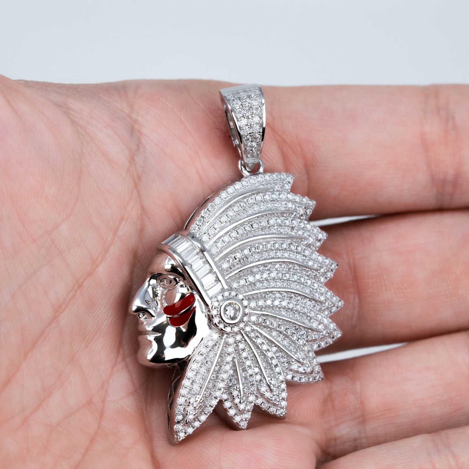 Native American Indian Moissanite Pendant in 925 sterling silver, featuring 2.59ct stones, shown in a hand for scale.