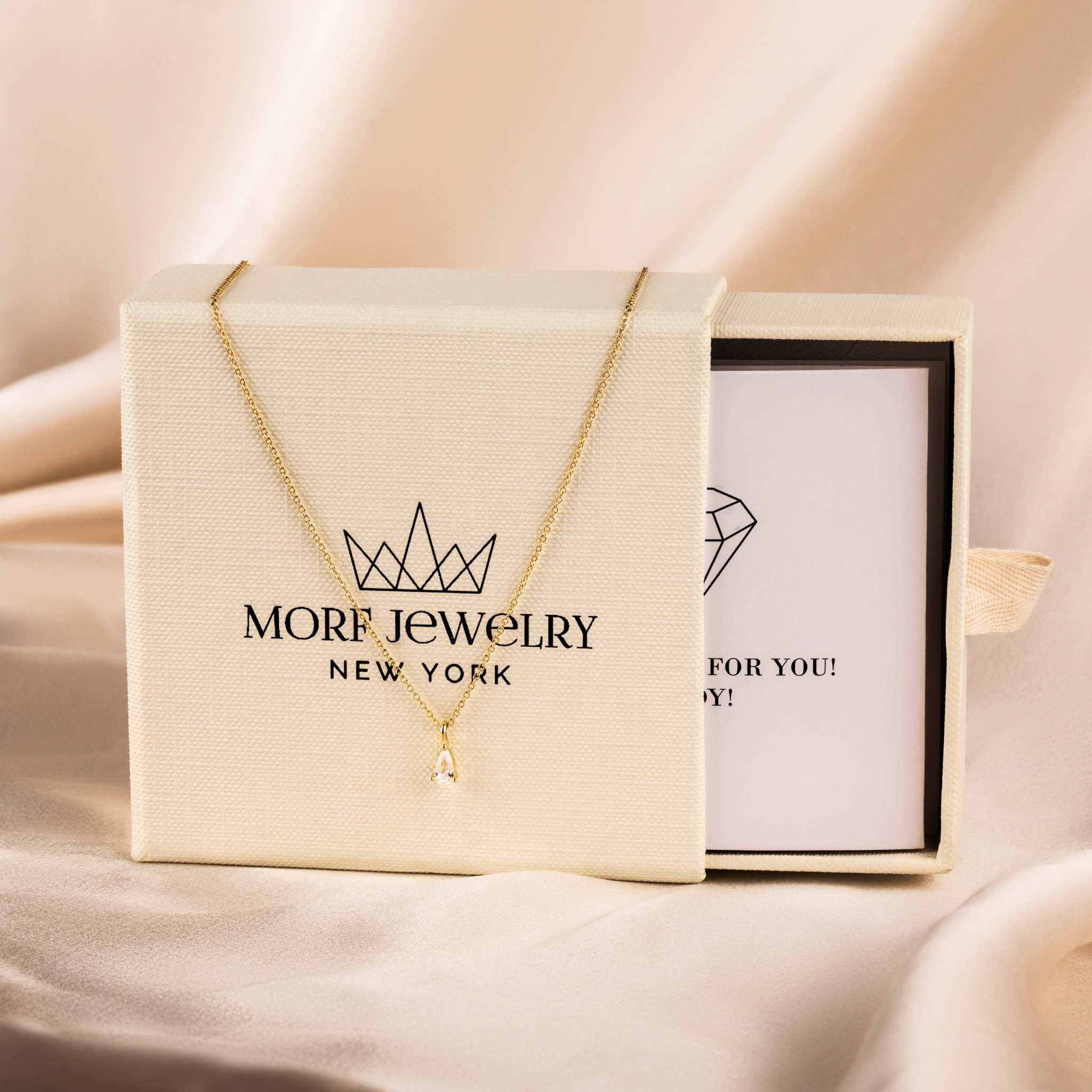 Teardrop Diamond Necklace by Morf Jewelry in 18K gold finish, featuring adjustable chain and pear-shaped diamond charm.