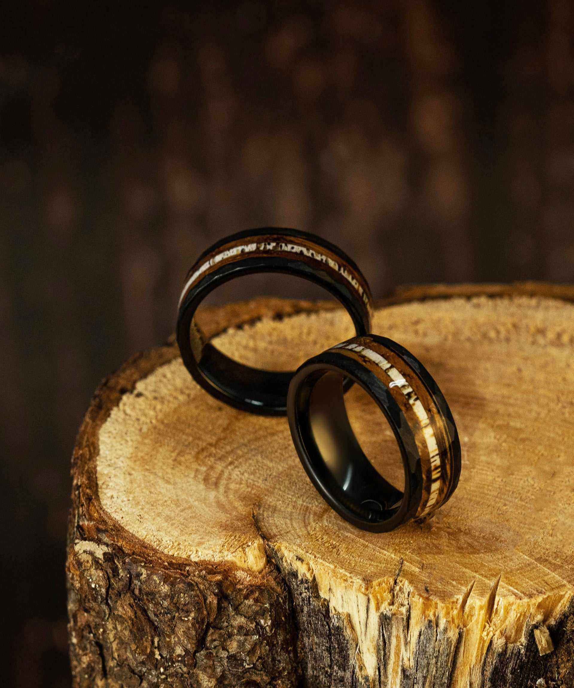 Hammered Antler Ring in tungsten on wooden surface, unisex and comfort-fit design.