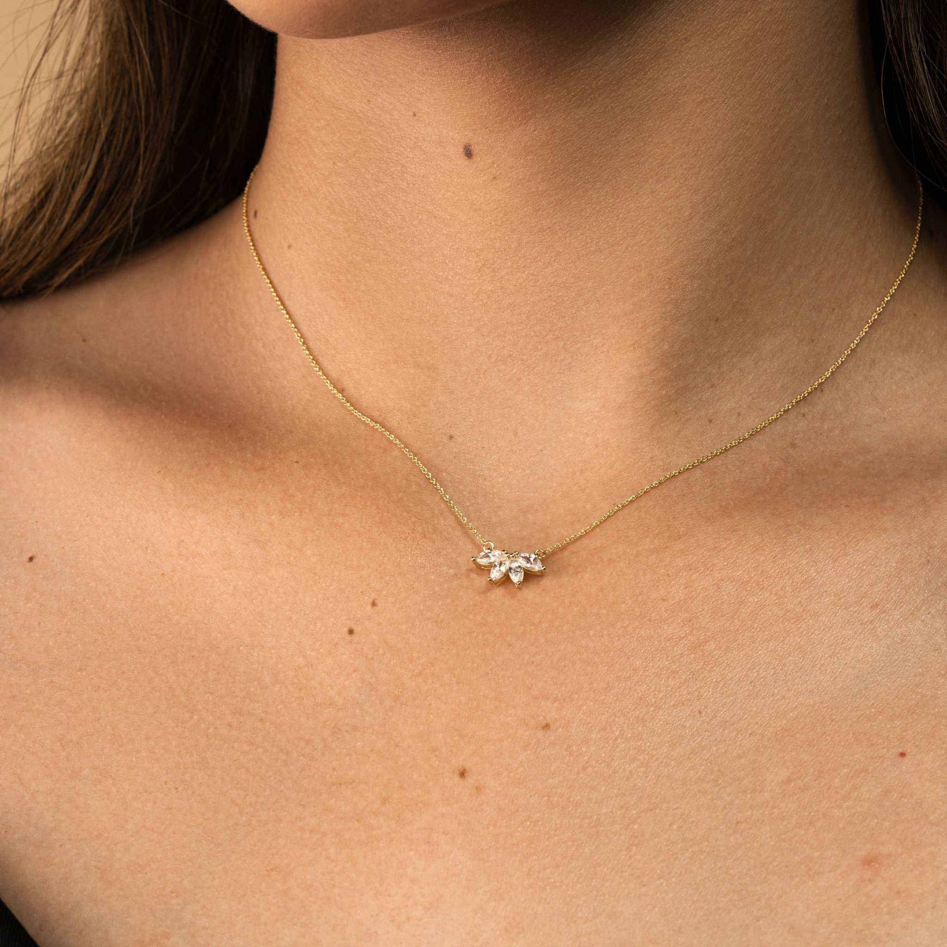 Marquise Flower Necklace with floral design and marquise diamonds on a 14k gold over brass chain.