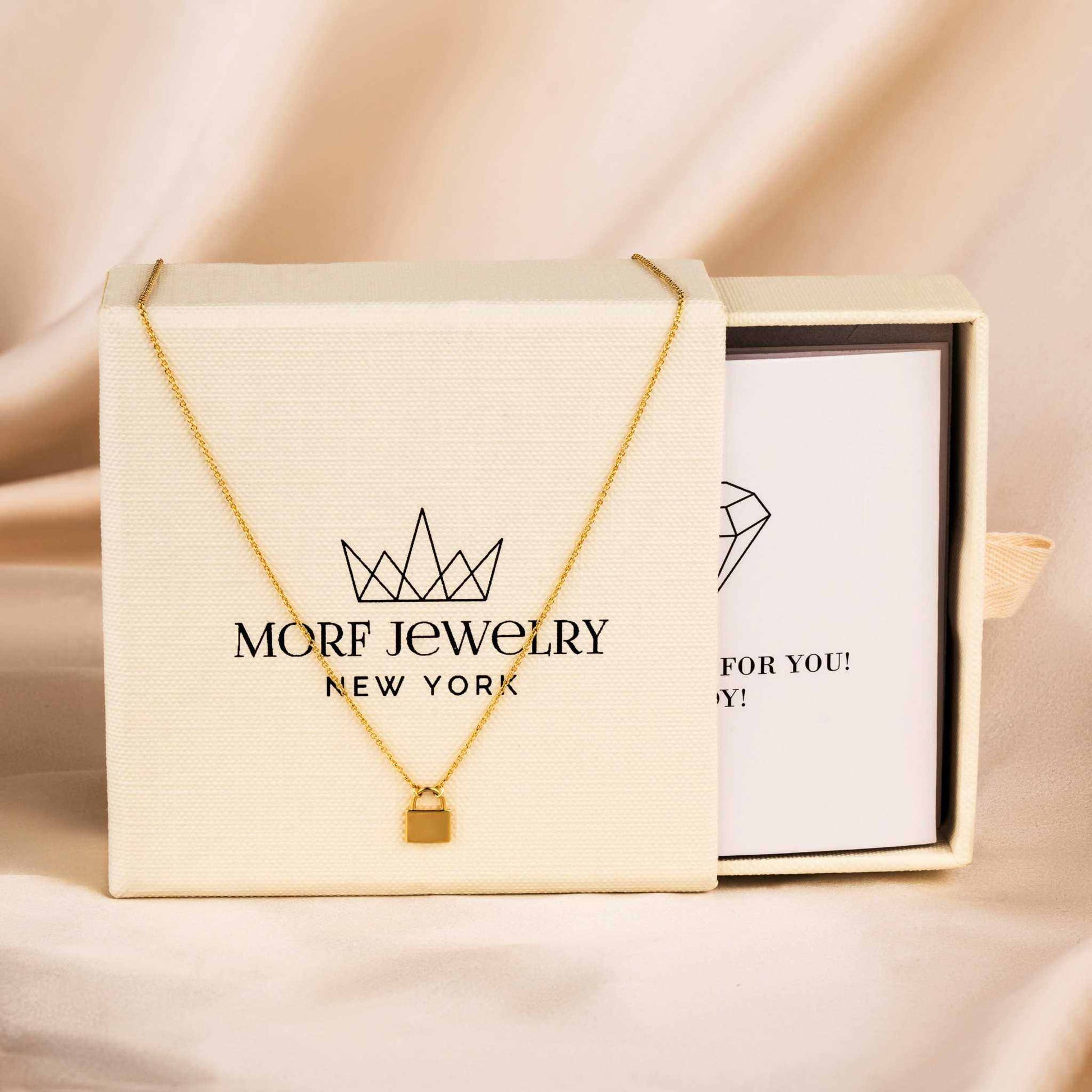 Handmade 14K gold over brass padlock necklace on adjustable 1.5mm cable chain with lobster clasp.