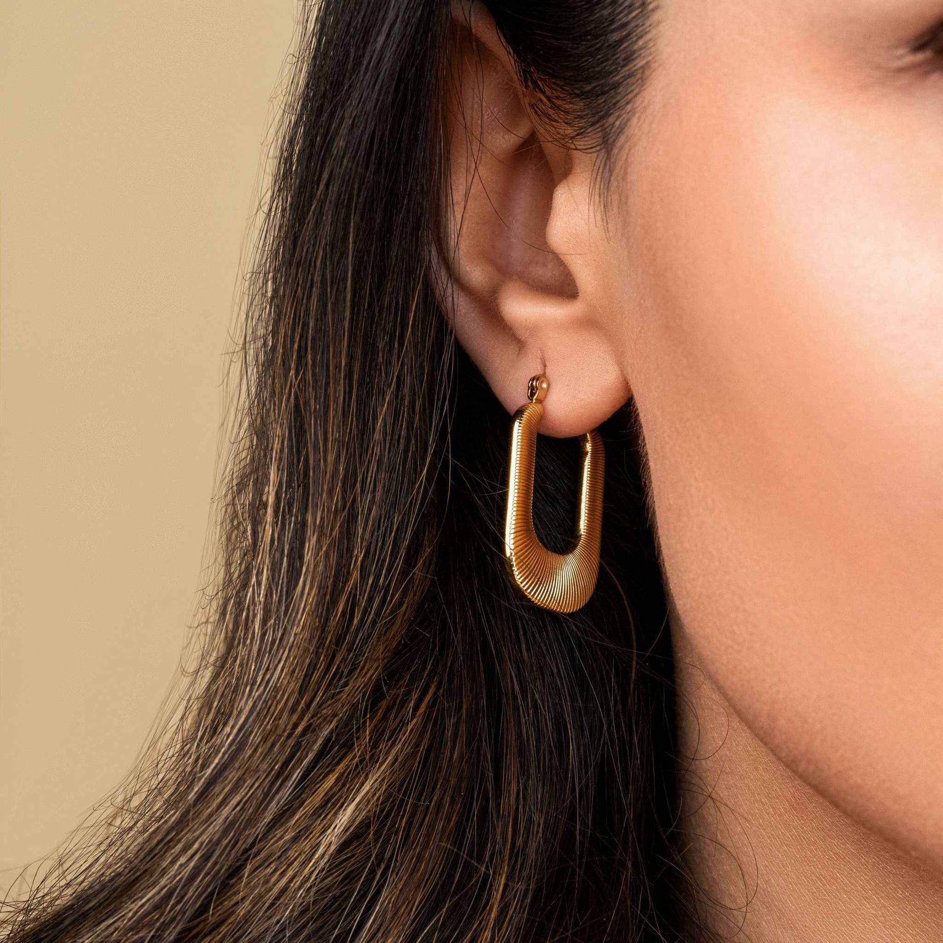 Solstice Earrings with 18k PVD gold plating, hypoallergenic and tarnish-free.