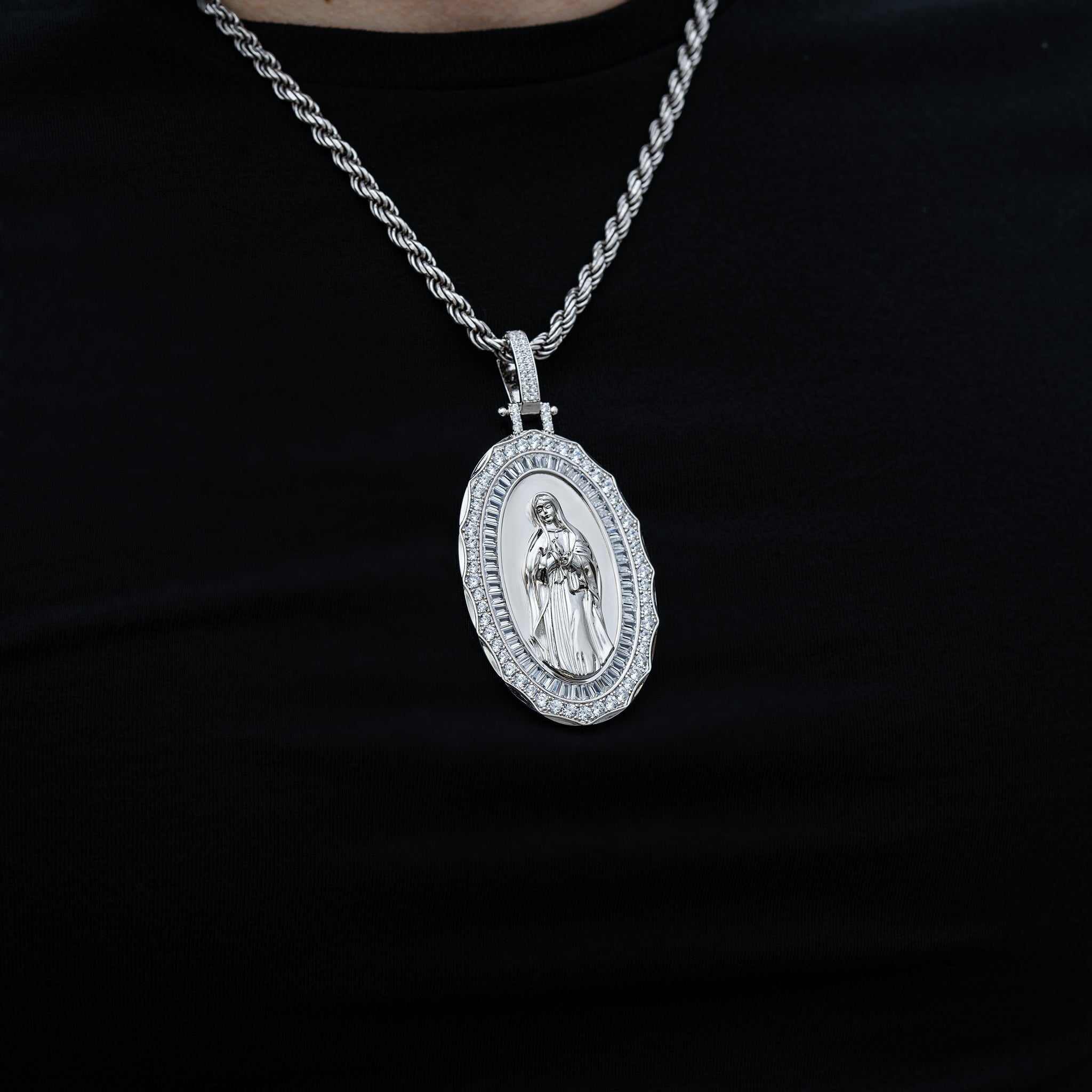Solid 925 Sterling Silver Virgin Mary Pendant with Clear CZ Stones on Black Background.
