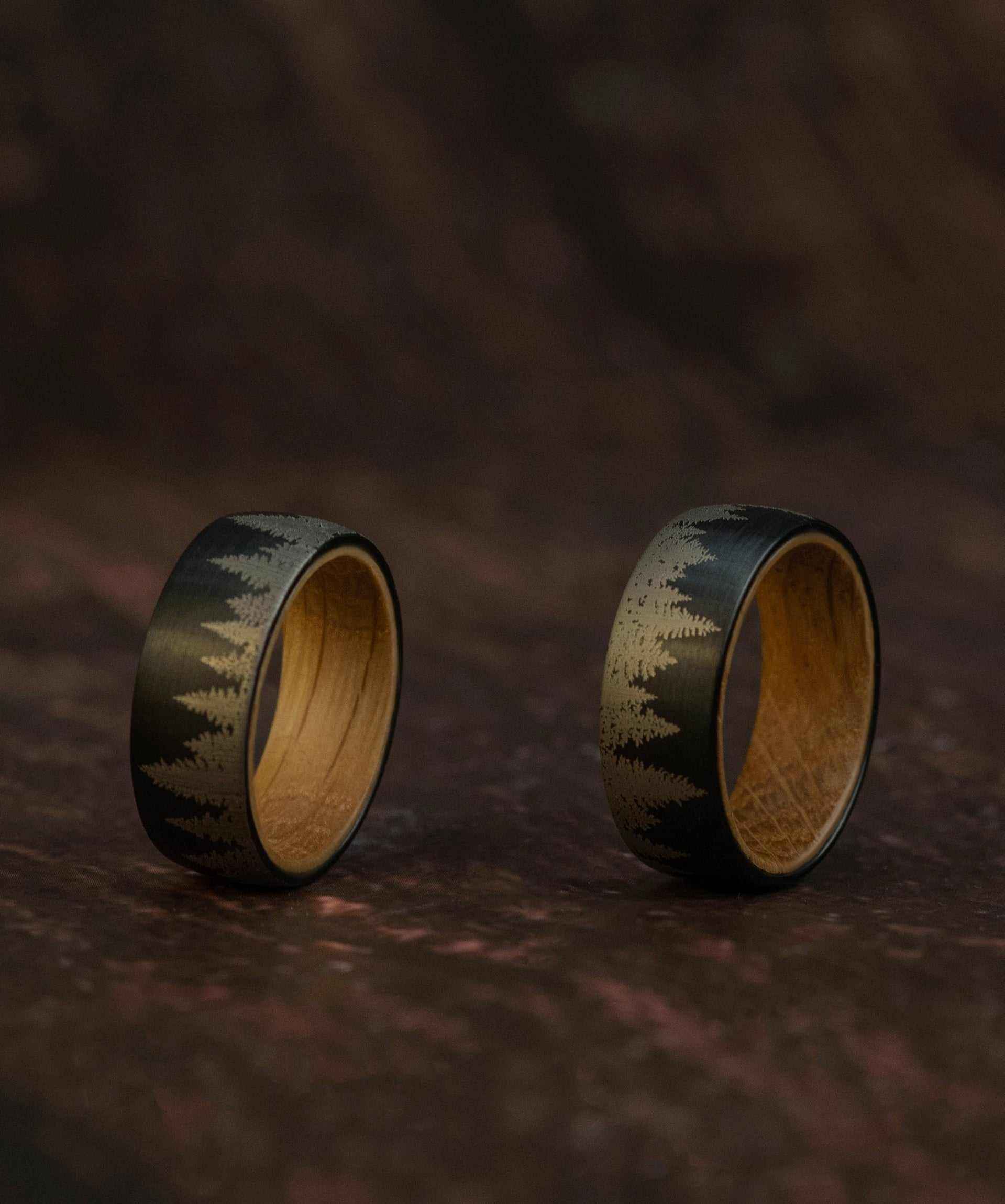 Pine Tree Forest Ring with whiskey barrel oak wood and etched tungsten band.
